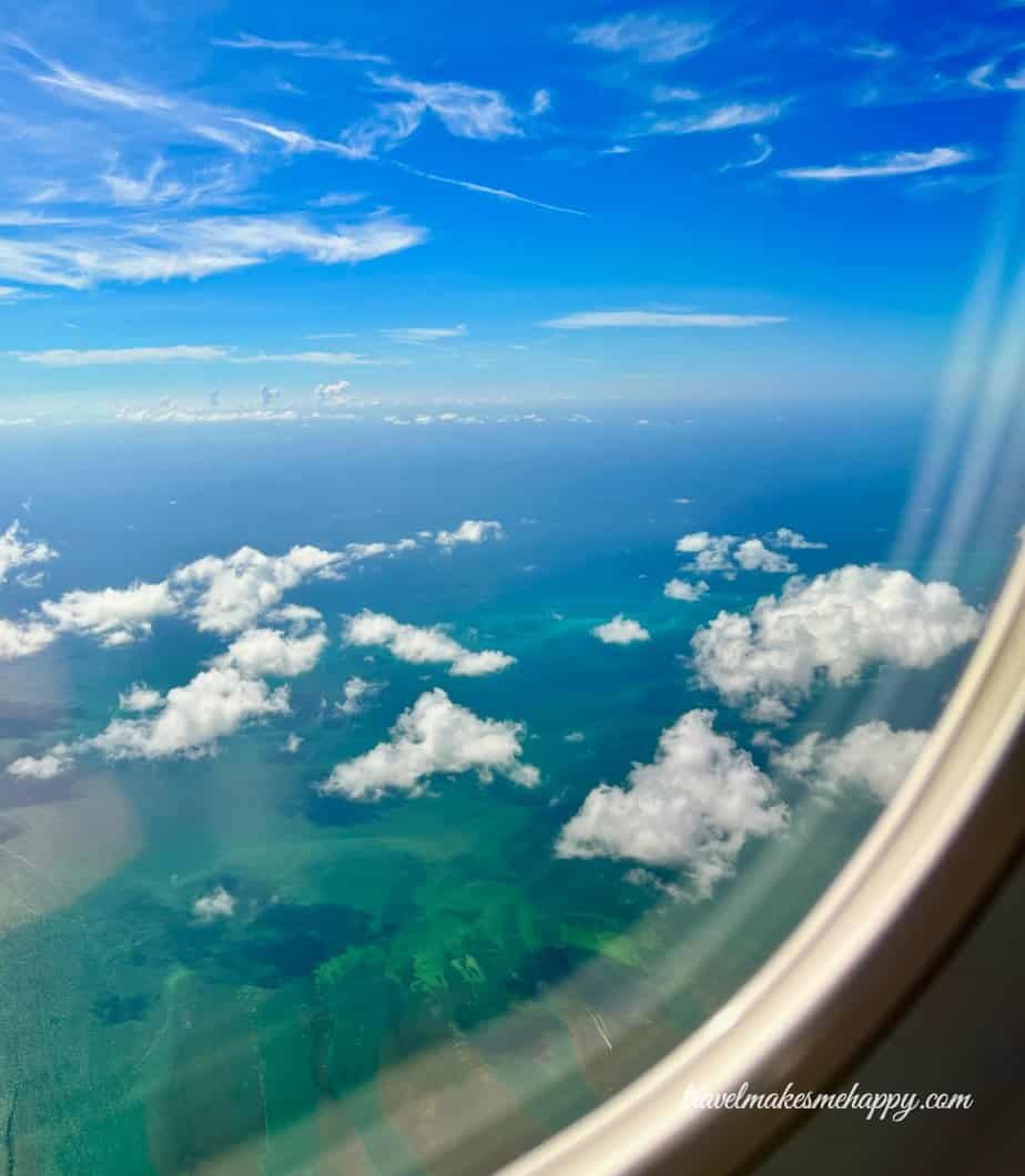 Airplane window view of Key West travel style