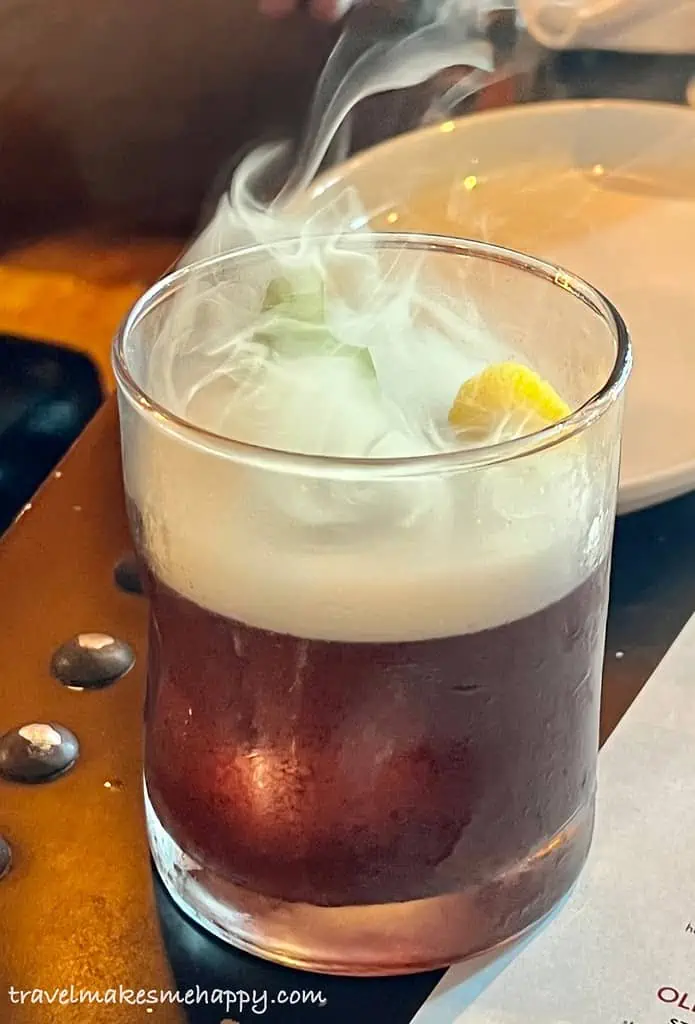 best adult disney trip Smoked bourbon cocktail at Disney Springs