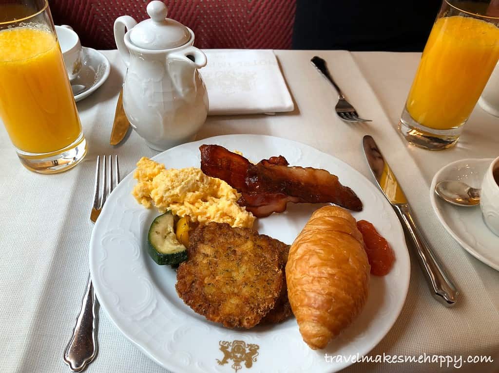 breakfast dish with juice at Hotel Imperial Vienna budget tips