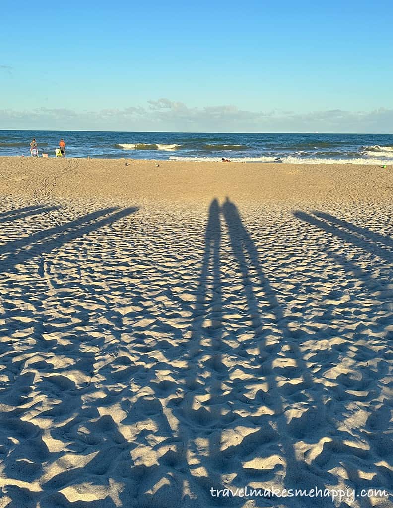 beach shadow view couple romantic travel