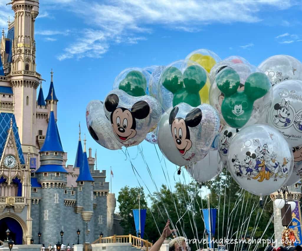 disney world is a magical adult trip idea magic kingdom balloons and castle