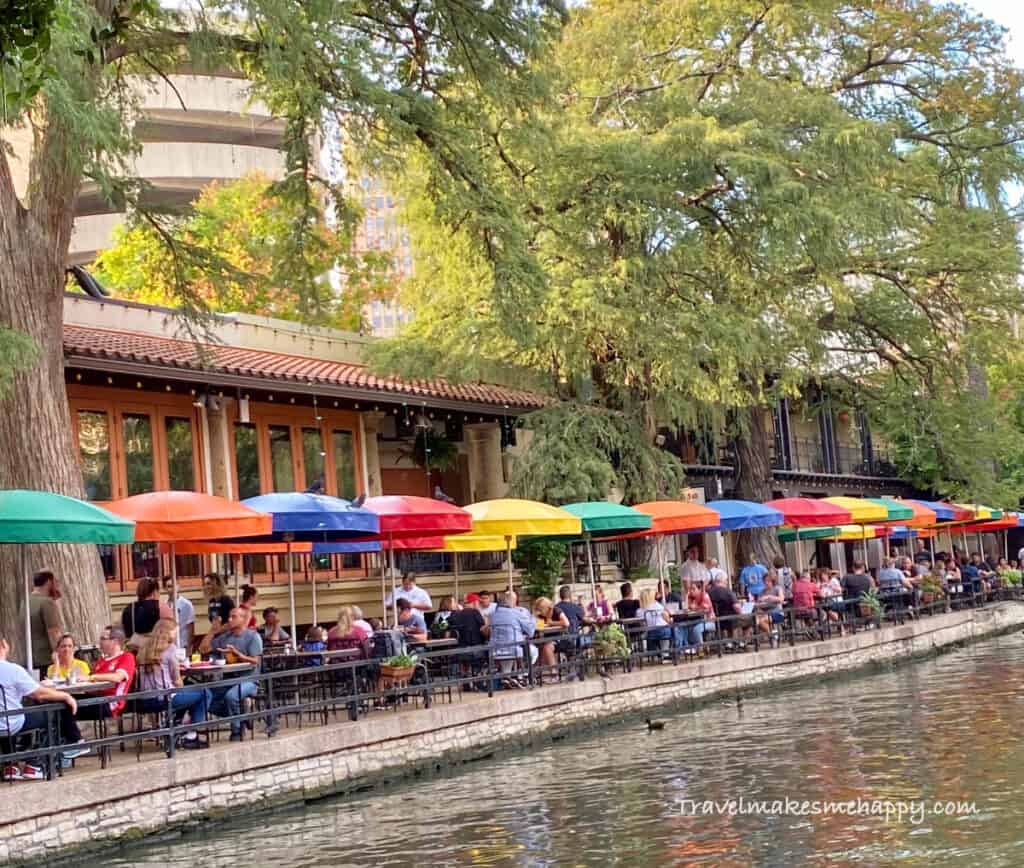 san Antonio riverwalk colorful umbrellas cafe weekend getaway