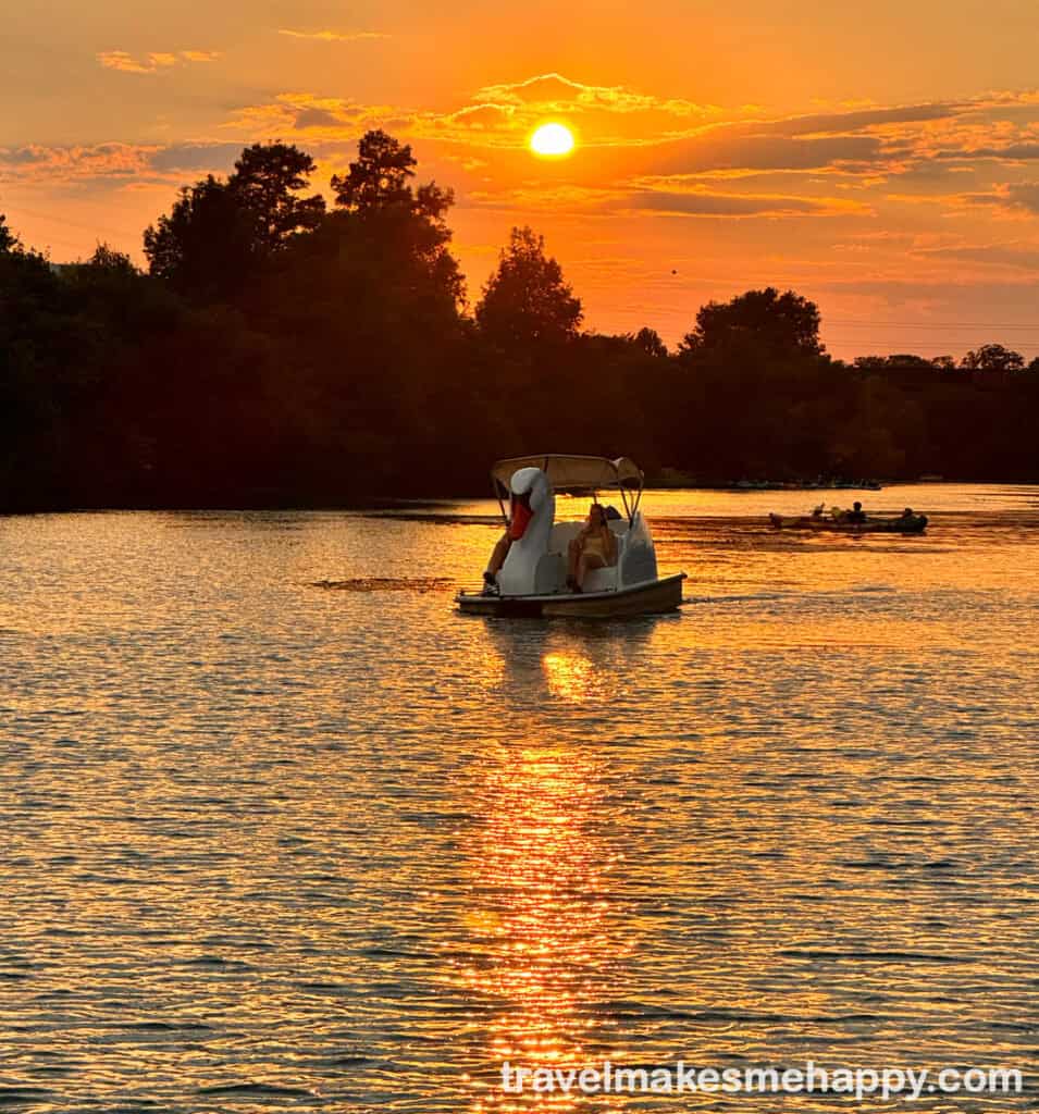 austin best weekend trip things to do swan boats tour on lake at sunset