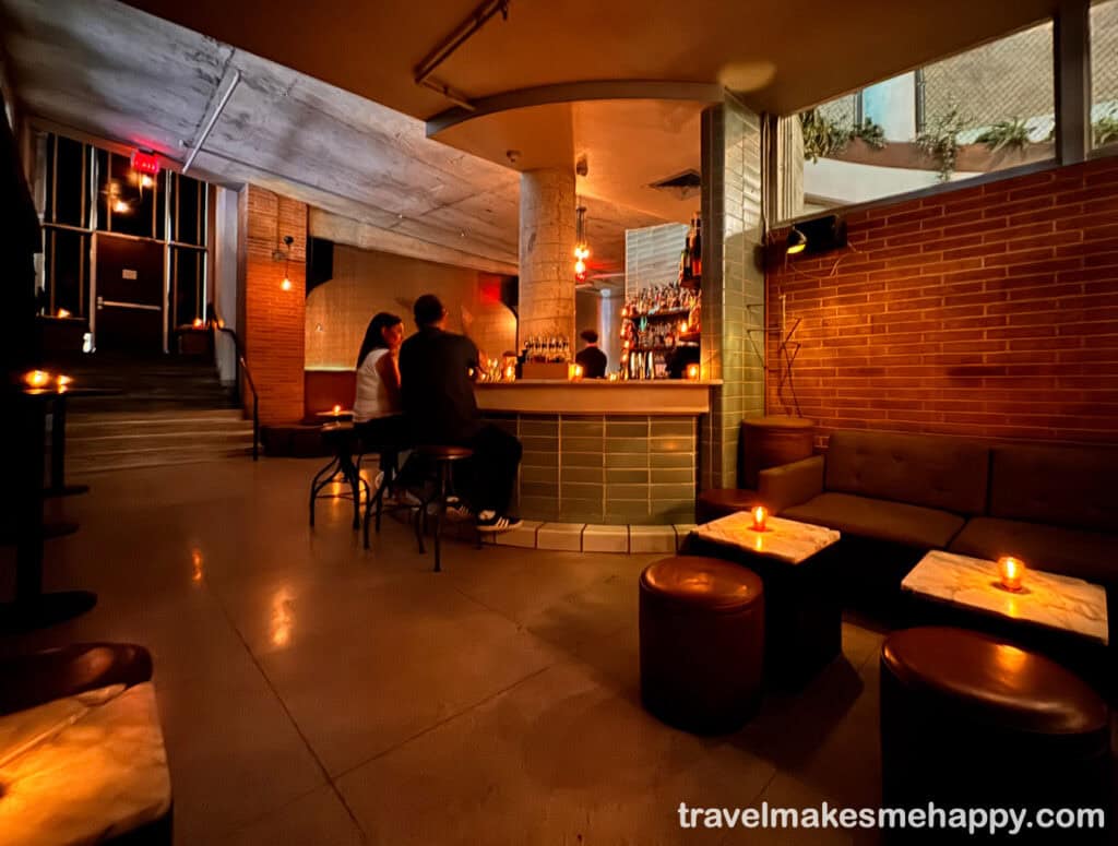 the inside of garage bar has a chic speakeasy feel and amazing cocktails it is one of Austin's best bars
