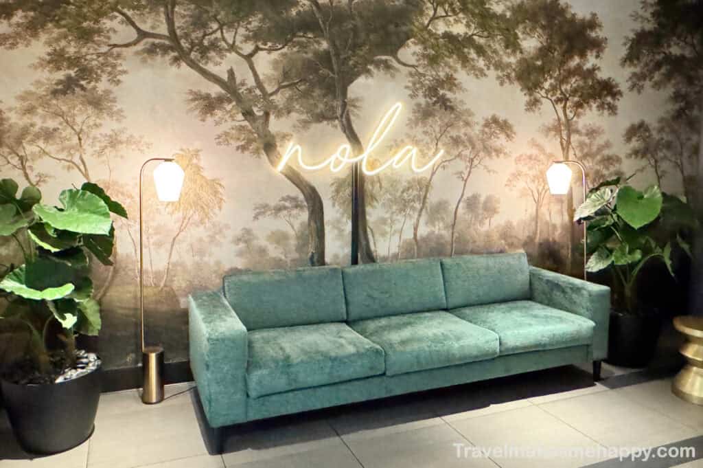 club msy new orleans airport lounge updated welcoming NOLA sofa entrance