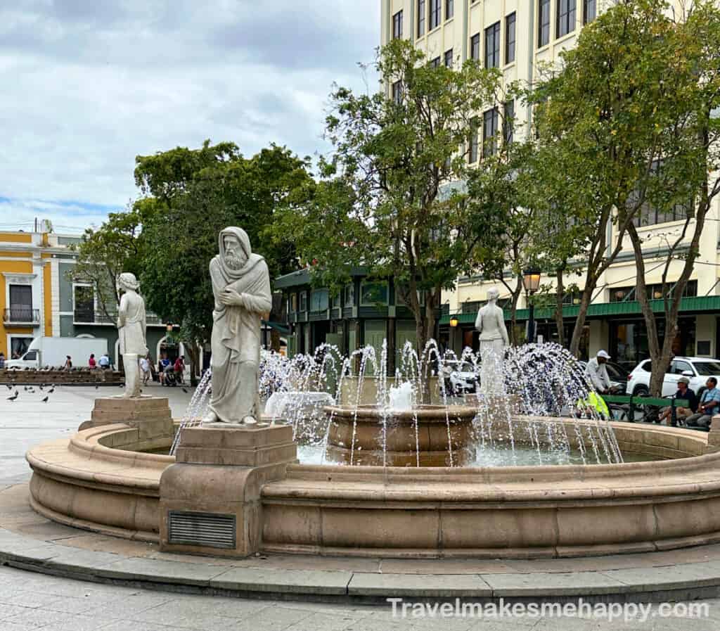 Old san juan living statues fountain in plaza de armas