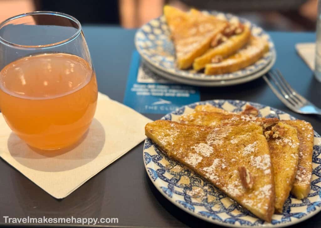 The club msy airport lounge new orleans french toast and mimosa