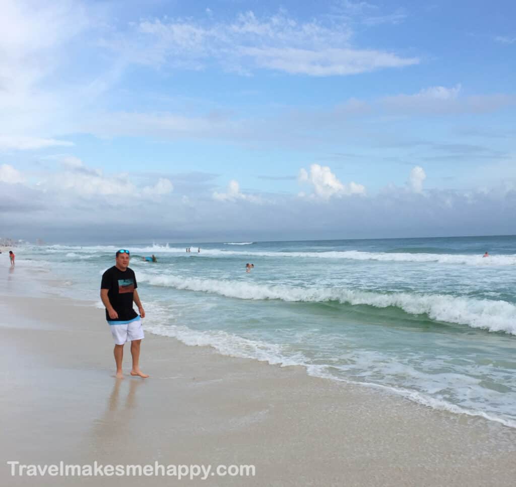 panama city beach view man walking top destinations for summer