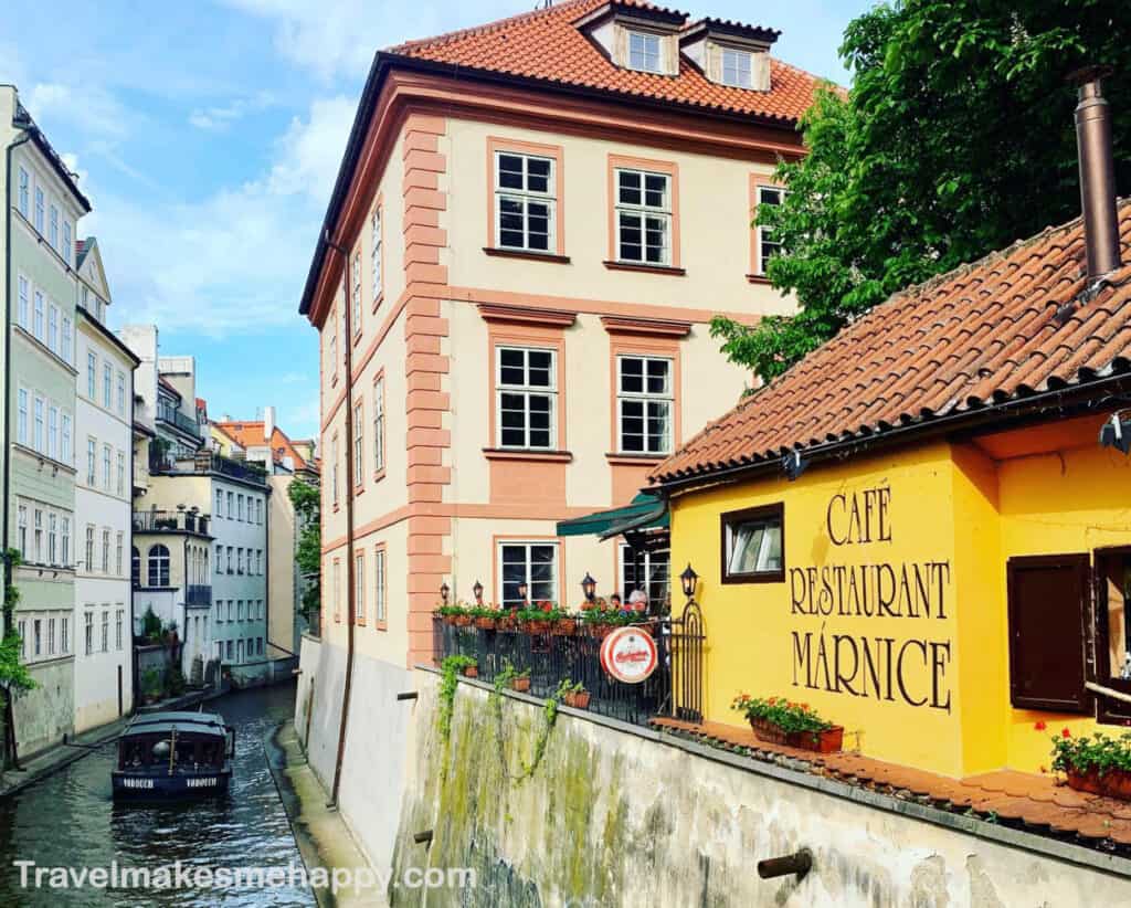 cafe marnice near charles bridge in prague river view