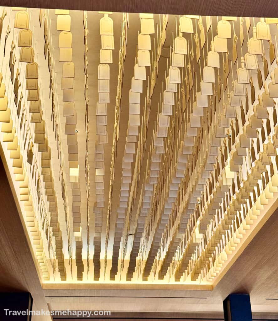 the art luggage tag ceiling at le cafe louis vuitton new york city