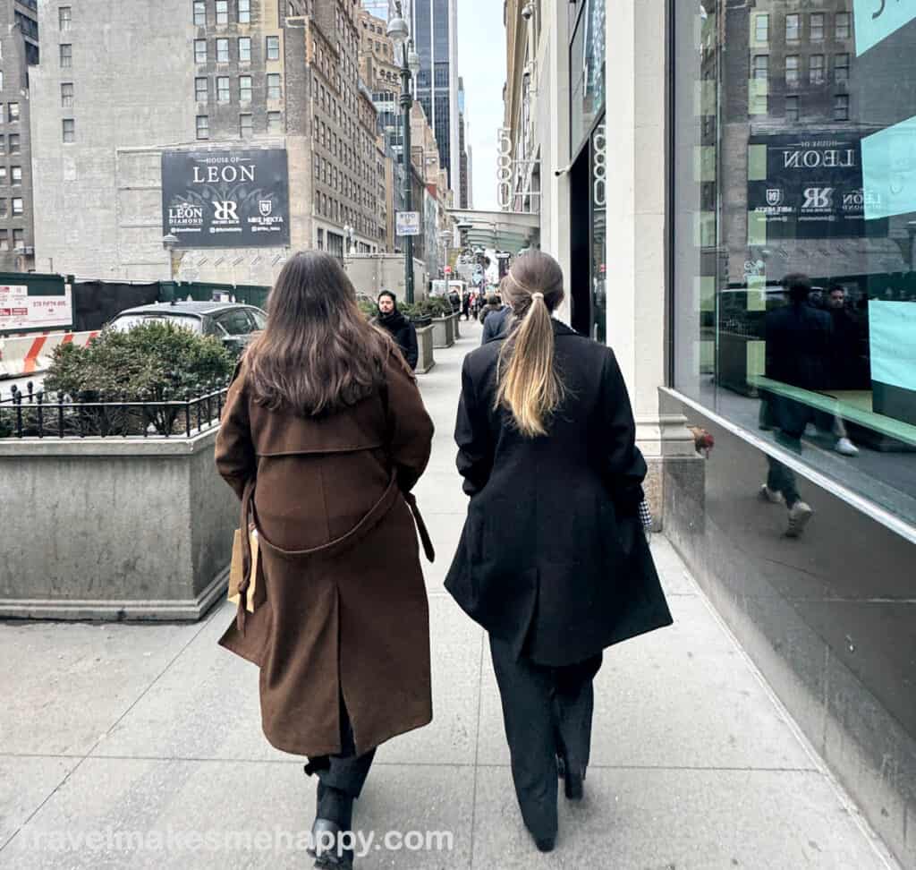 2 women walking in new york travel planning